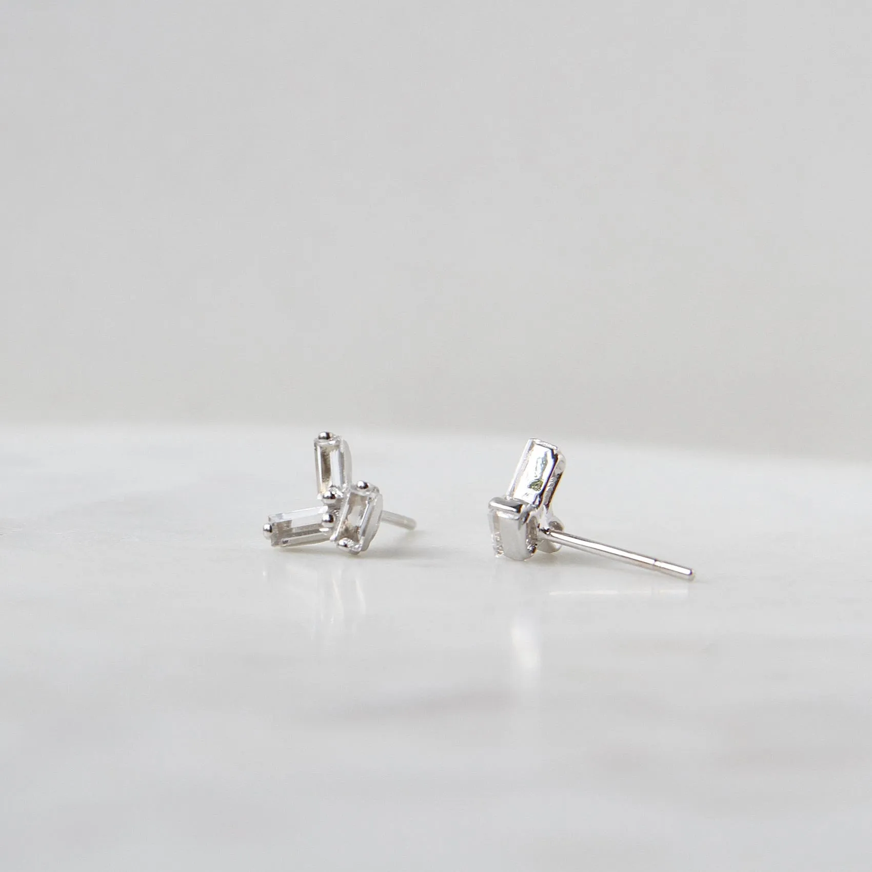 14k White Gold White Topaz Scattered Baguette Earrings