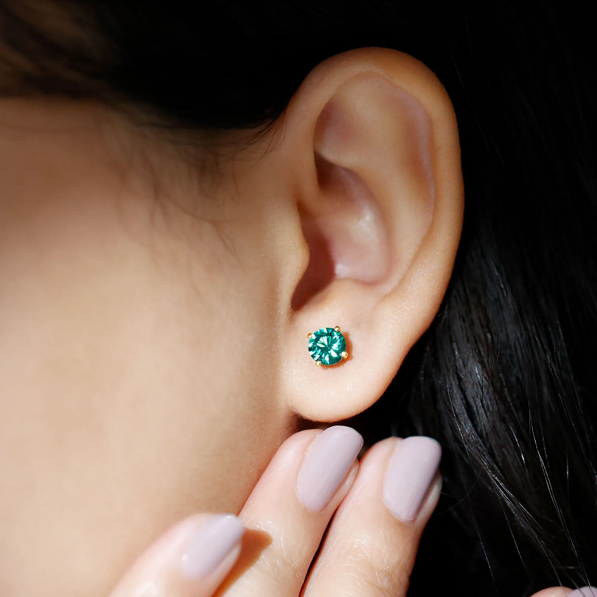 Elegant Created Emerald Solitaire Stud Earrings in Gold