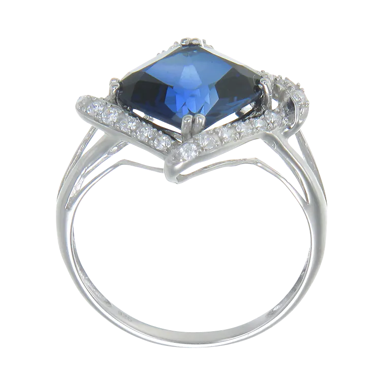 Elegantly Framed Blue Sapphire Ring