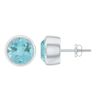 Round Shape Sky Blue Topaz Solitaire Stud Earrings in Bezel Setting